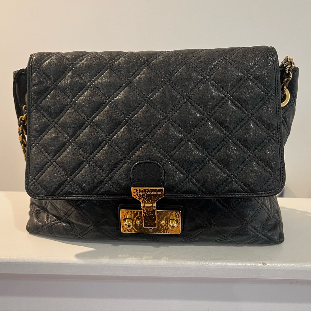 Marc Jacob’s version of Chanel shoulder bag. Beautiful dressy purse.